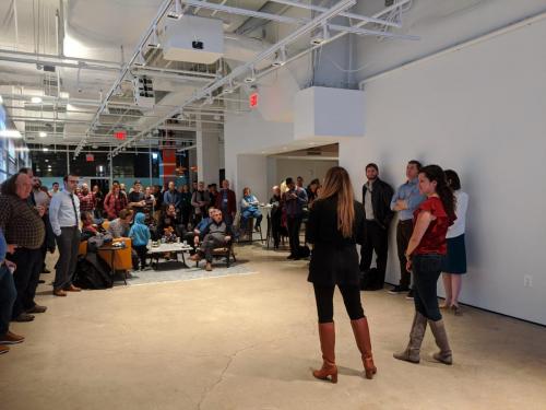 Representatives from the Crystal City BID, co-hosts of the event, say a few words about.